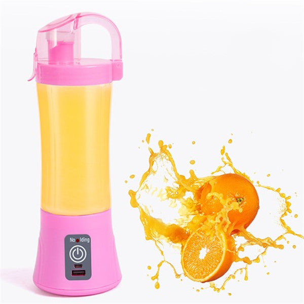 Rinsing the water-resistant portable blender cup under running tap water