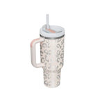 Fitness enthusiast drinking from a 40oz straw tumbler during daily workout session.