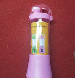 Person blending fresh fruit smoothie using a handheld rechargeable electric juicer cup