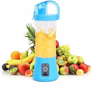 Portable electric personal blender with fresh fruits on a modern kitchen countertop