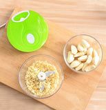 Freshly minced garlic, onions, and herbs inside the clear 400ml prep container bowl.