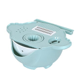 Handguard safety shield keeping fingers safe while slicing potatoes with the mandoline cutter.