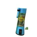 Single-serving fresh fruit smoothie blended instantly in a portable personal juicer cup.