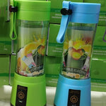 Lightweight 380ml portable mini juicer packed inside a traveler backpack side pocket.