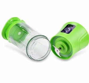 Rechargeable mini blender bottle being used outdoors during a travel hike
