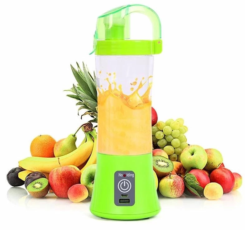 Portable smoothie blender plugged into a laptop via USB charging cable